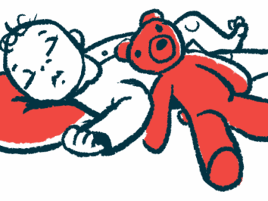 A baby naps with her head on a pillow as a stuffed toy rests next to her.