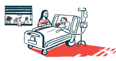 An adult sits next to the hospital bed of a child receiving an intravenous, or into-the-vein, infusion.