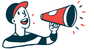 A person in a baseball cap speaks through a megaphone.